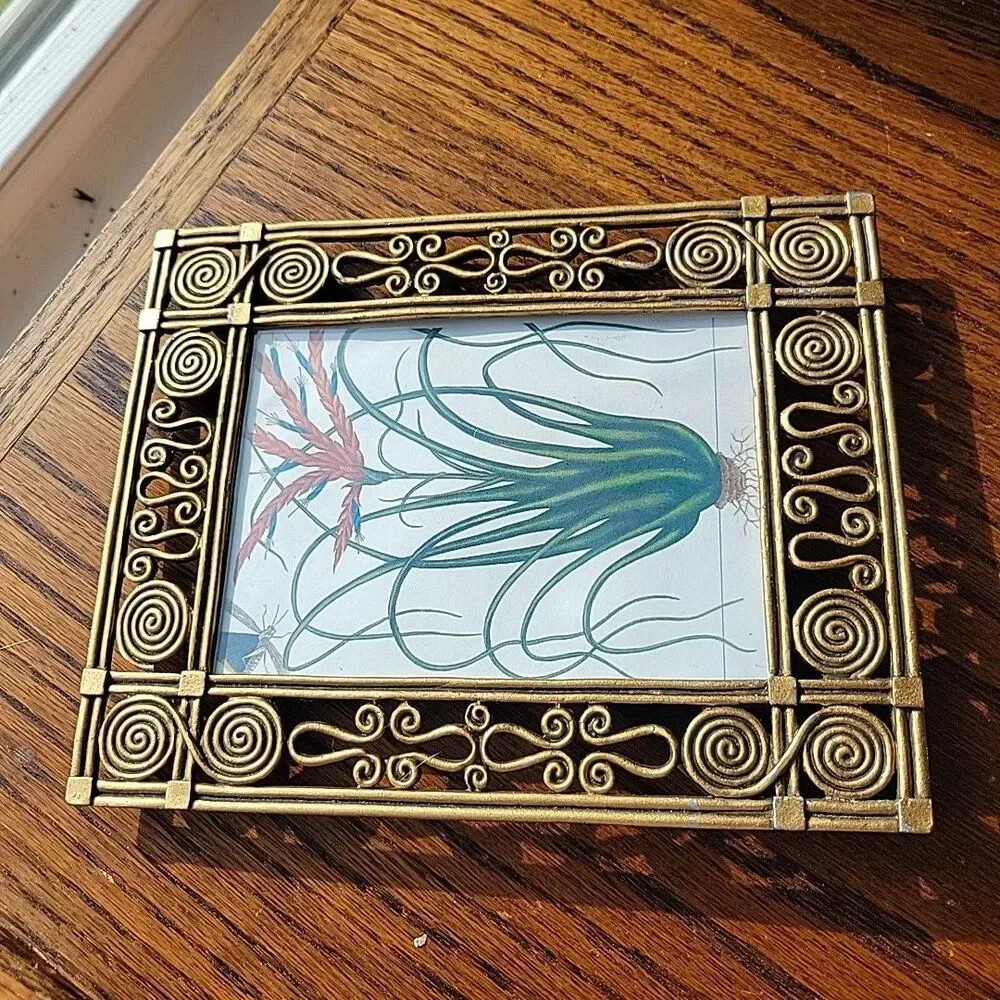 Vtg picture frame features ornate openwork metal hieroglyph antiqued gilt boho